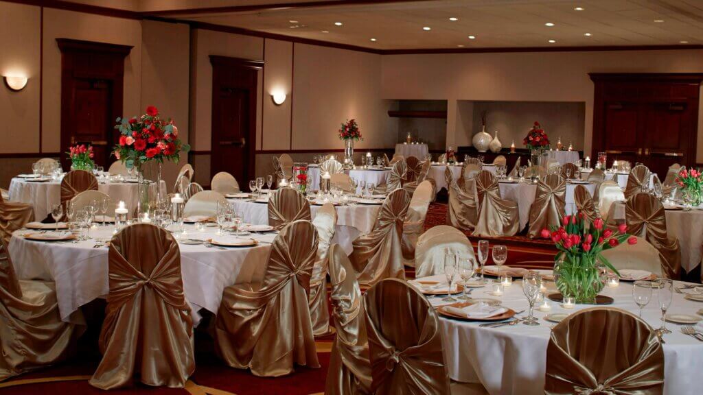Marriott Cincinnati North ballroom reception setup with gold chairs